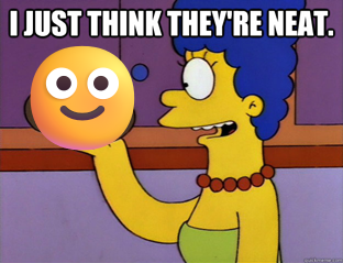 Marge Simpson saying ‘I just think they’re neat.’ while holding an emoji